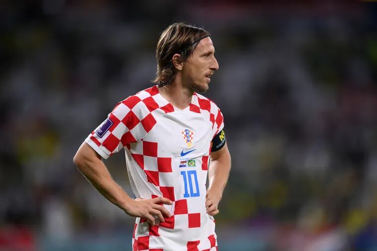 Luka Modric of Croatia looks on during the FIFA World Cup Qatar 2022 quarter final match between Croatia and Brazil at Education City Stadium on December 09, 2022 in Al Rayyan, Qatar. (Photo by Laurence Griffiths/Getty Images)