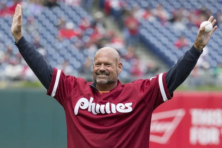Former Philadelphia Phillie Darren Daulton comes out for the “first pitch” prior to the first inning of a baseball game against the Cincinnati Reds in May 2016.