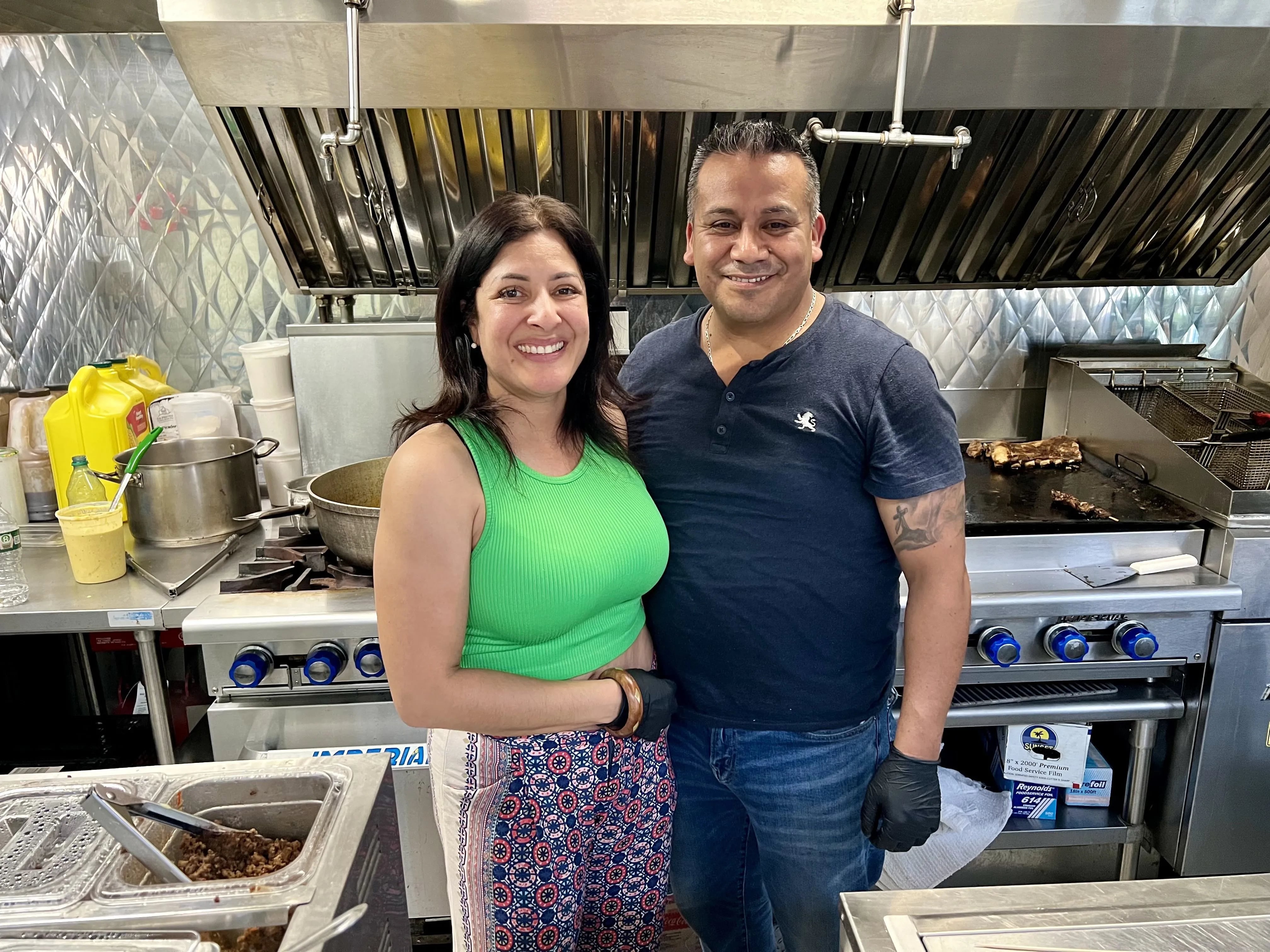 Mariangeli Alicea Saez and Dionicio Jimenez at their pop-up restaurant on Cherry Street Pier on June 14, 2024.