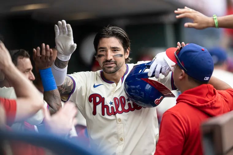 Phillies right fielder Nick Castellanos is congratulated after his two-run homer against Milwaukee on Wednesday.