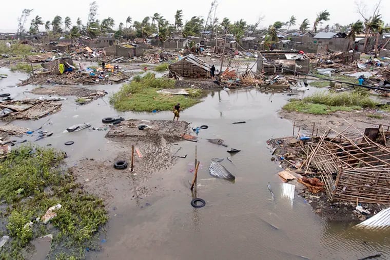 In this photo taken on Friday, March 15, 2019 and provided by the International Red Cross, an aerial view of the destruction of homes after Tropical Cyclone Idai, in Beira, Mozambique. Mozambique's President Filipe Nyusi says that more than 1,000 may have by killed by Cyclone Idai, which many say is the worst in more than 20 years. Speaking to state Radio Mozambique, Nyusi said Monday, March 18 that although the official death count is currently 84, he believes the toll will be more than 1,000. (Denis Onyodi/IFRC via AP)