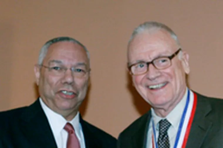 Colin Powell (left) presented Lee Hamilton with the Eisenhower Medal for exceptional leadership last night. Hamilton cochaired the Iraq Study Group.