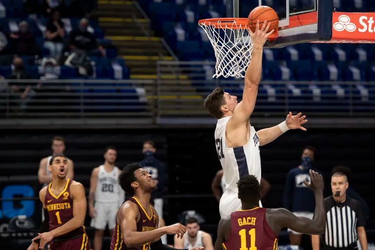 Penn State forward John Harrar lays up the ball during the team's game against Minnesota in March.