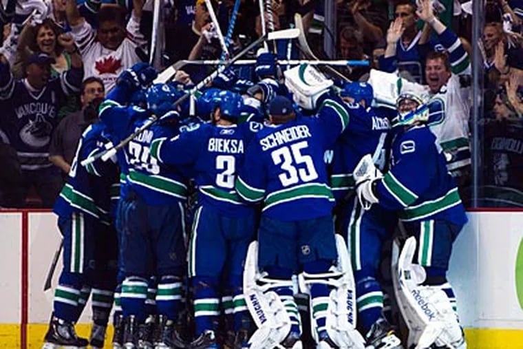 The Canucks lead the Bruins 2-0 in the Stanley Cup Finals. (AP Photo/The Canadian Press, Darryl Dyck)