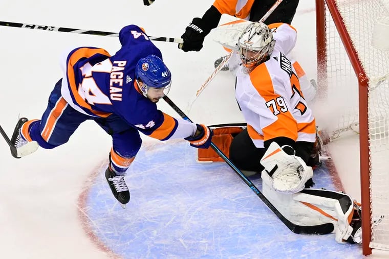 With saves like this against Islanders center Jean-Gabriel Pageau, goalie Carter Hart helped the Flyers get to a Game 7 in last season's conference semifinals.