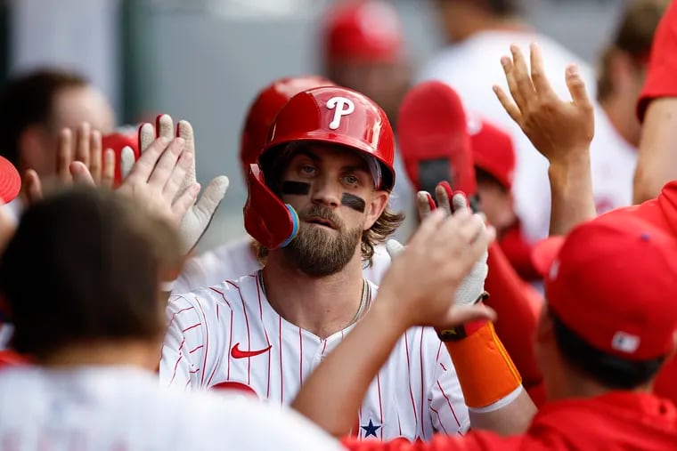 Bryce Harper celebrates his two-run homer against the Cleveland Guardians on Saturday.