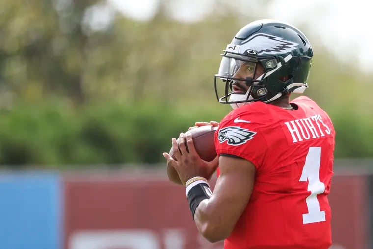 Eagles quarterback Jalen Hurts (1) looks to throw the ball during a joint training camp with the New England Patriots at the NovaCare Complex in South Philadelphia on Tuesday, Aug. 17, 2021.