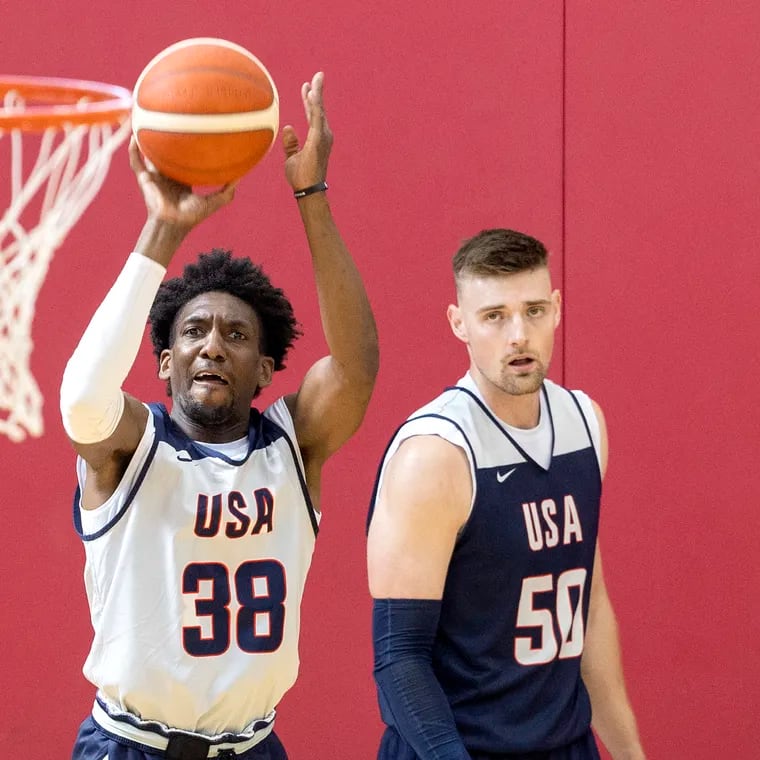 Langston Galloway shoots as Micah Potter looks on during training camp Team USA in July.