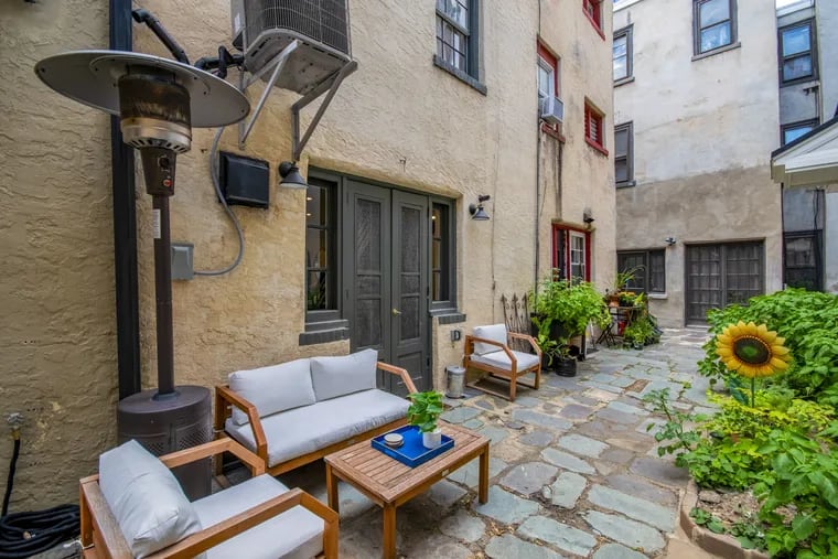 The home shares a courtyard with eight others in the Sansom Gardens cluster.