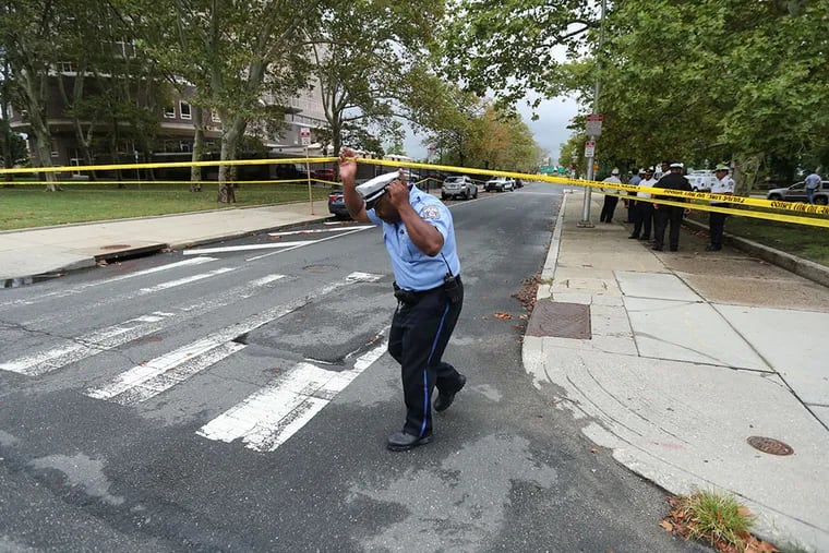 Crosswalk accident. Pedestrian with smartphone and headphones