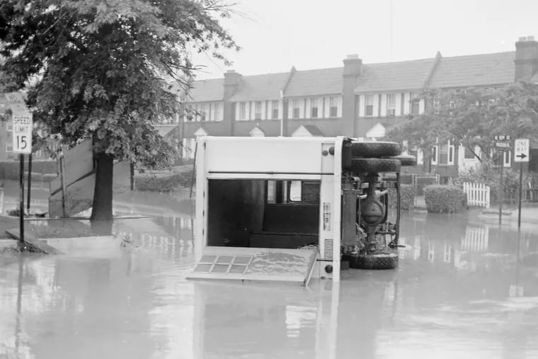 A new police rescue vehicle is stranded in floodwaters in Chester's Eyre Park development. The 1971 floods killed 10 people in the city and displaced 450 households.