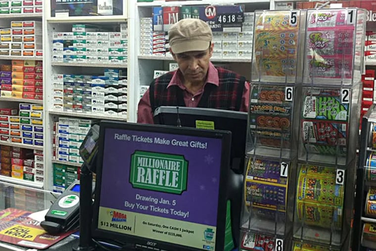 Ashok Kaul of Levittown News & Tobacco has tried to figure out which customer bought the winning ticket. BILL REED / Staff