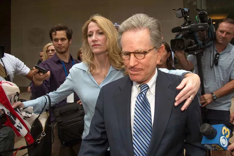 With niece Jaclyn Savitz clearing the way, Herbert Vederman leaves the federal courthouse in Philadelphia after being convicted, along with U.S. Rep. Chaka Fattah, of racketeering on June 21, 2016.