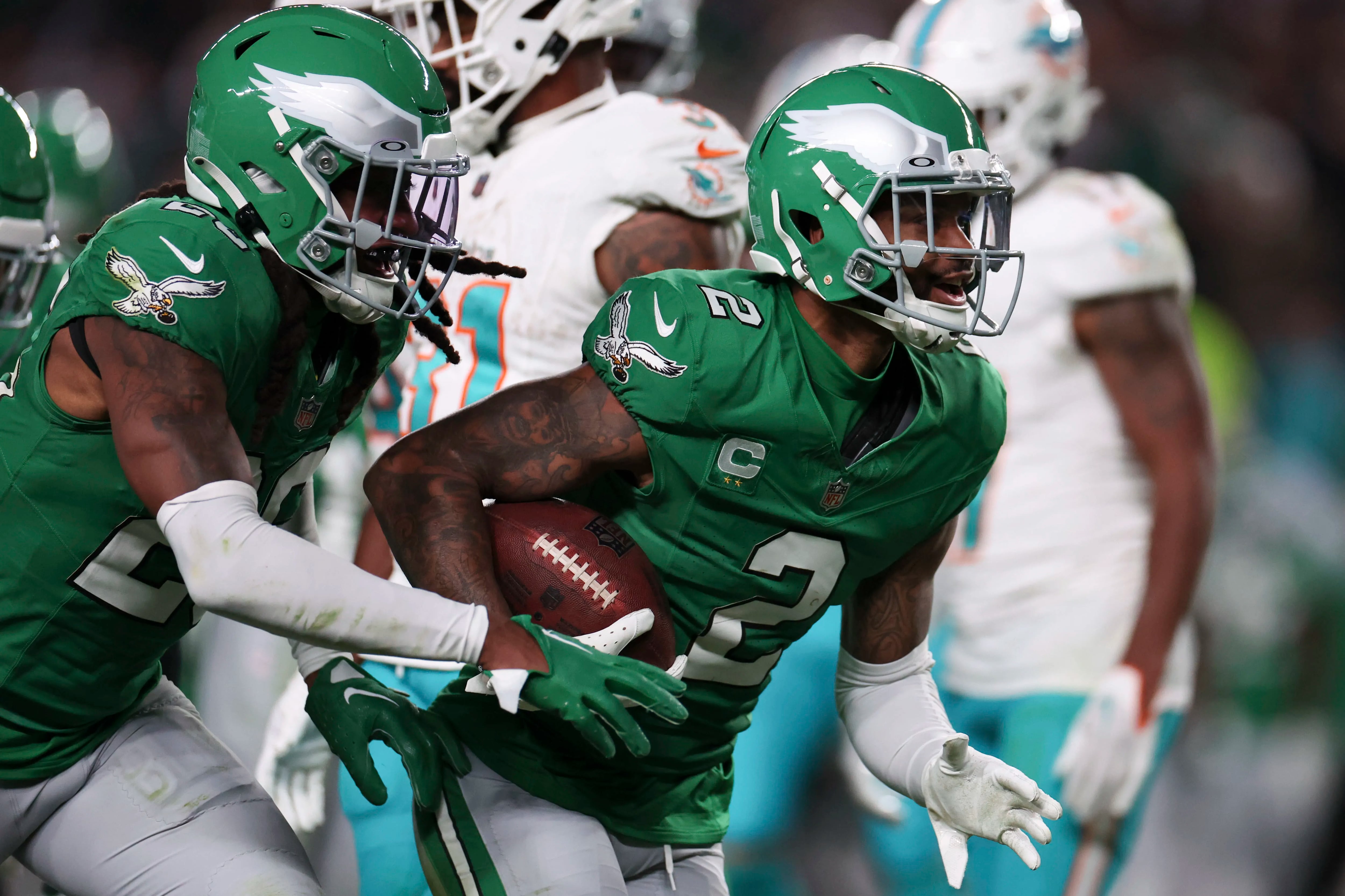 Hurts passes for 279 yards, throws a TD and runs for one in Eagles' 31-17  win over Dolphins