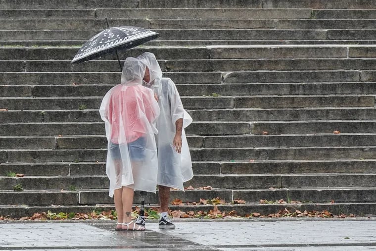 Ponchos and umbrellas will be the necessary equipment of the evening with heavy rain and gusty winds in the forecast.