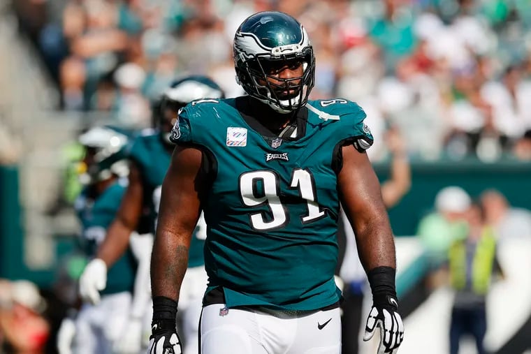 Eagles defensive tackle Fletcher Cox walking off the field against the Kansas City Chiefs on Sunday.