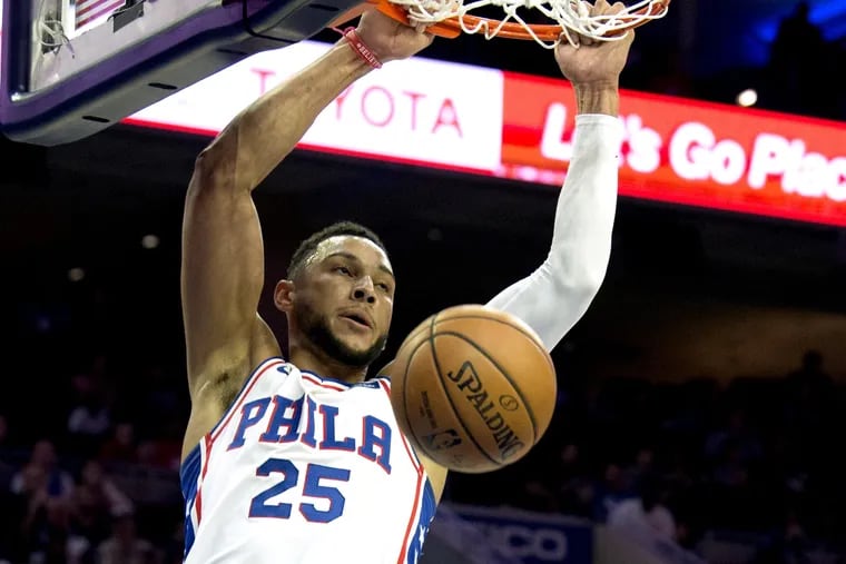 Sixers Ben Simmons slam dunks in the first quarter of their preseason game against the Orlando Magic October 1, 2018. TOM GRALISH / Staff Photographer