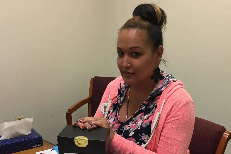 Naiymah Sanchez, GALAEI's TransHealth Information Project coordinator, claims the remains of Diamond Williams from the Medical Examiner's Office.