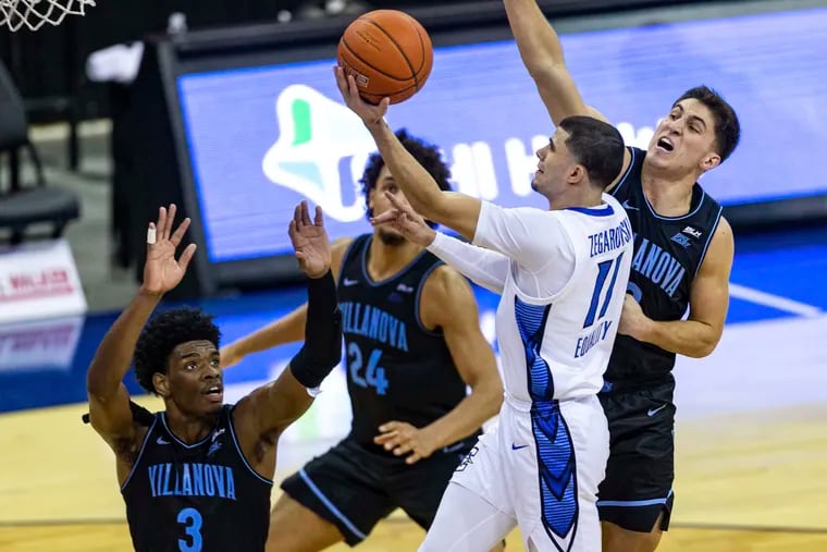 Creighton guard Marcus Zegarowski making a layup against Villanova forward Brandon Slater (3), forward Jeremiah Robinson-Earl (24), and guard Collin Gillespie (2) in the second half Saturday.