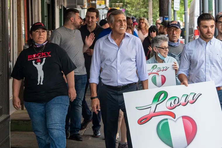 Pennsylvania Republican gubernatorial candidate Lou Barletta, an ex-congressman and close ally of former President Donald Trump, campaigns in the Italian Market in South Philadelphia on May 25.