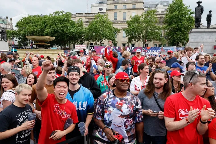 Fans cheer during the Phillies and Mets Trafalgar Square Takeover in London on Friday.