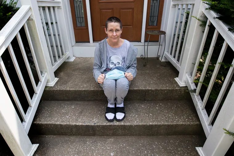 Stacey Horrocks, on her porch in Boyertown, is among thousands of residents in Pennsylvania who applied for rental assistance.