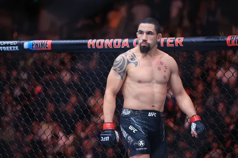 Robert Whittaker of New Zealand prepares to face Paulo Costa of Brazil in their middleweight fight during UFC 298 at Honda Center on February 17, 2024 in Anaheim, California. (Photo by Sean M. Haffey/Getty Images)