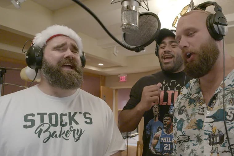 Former Eagles lineman Jason Kelce (left) and current linemen Jordan Mailata (center) and Lane Johnson in the studio recording "A Philly Special Christmas Special," the trio's second holiday album.