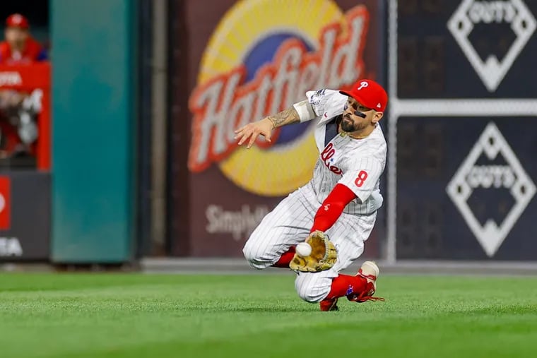 Bryson Stott of the Philadelphia Phillies catches a fly ball in