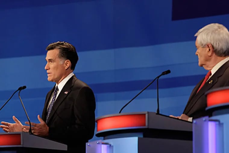 Presidential candidate Mitt Romney (left) has been turning up the criticism of Newt Gingrich as the former speaker rises in national polls. (Eric Gay / Associated Press, Pool)