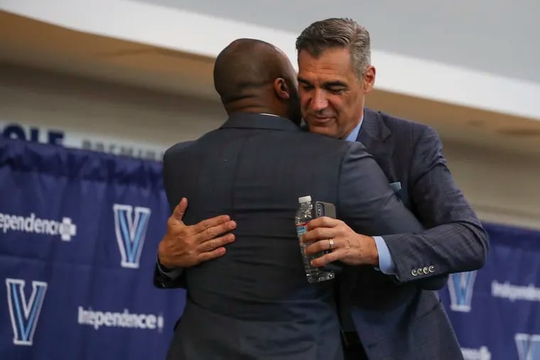 Jay Wright hugs his Villanova successor, Kyle Neptune. "There’s never been a [Villanova] coach who hasn’t been successful, and the coach that follows me will be successful,. I guarantee it – because of this place." Wright said.