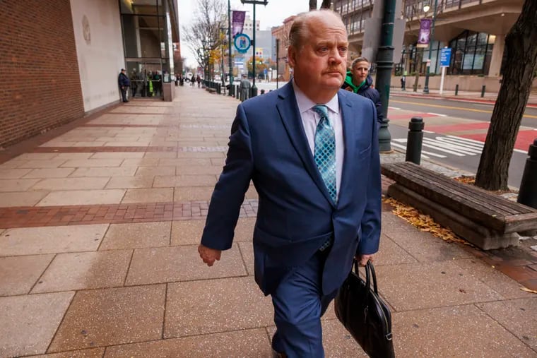 Brian Burrows, former president of Local 98 of the International Brotherhood of Electrical Workers, leaves the federal courthouse in Center City Philadelphia after he was convicted in a $600,000 embezzlement scheme involving himself and five other union officials and employees.