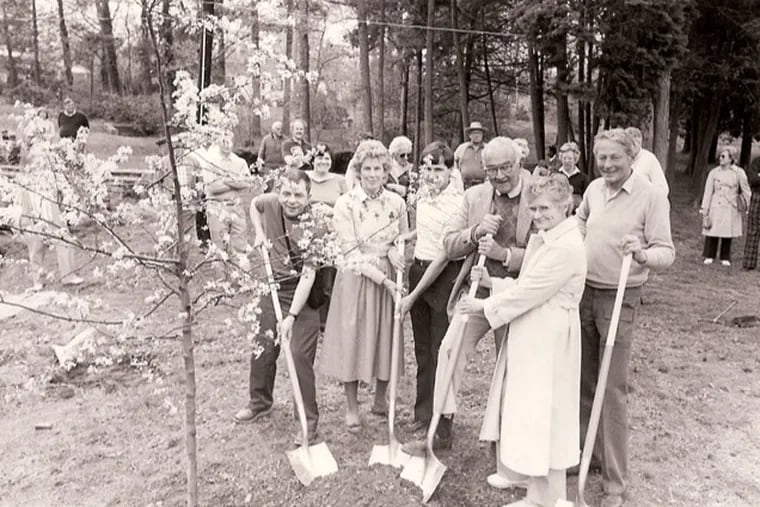 Quita Woodward Horan, with the Friends of Pastorius, at a tree planting. She is second from left in the front row.