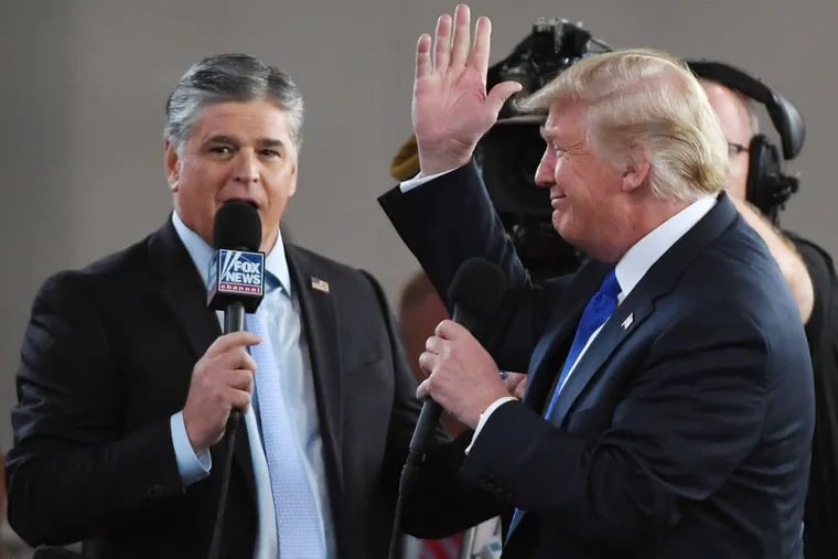 Fox News host Sean Hannity (left) interviewing then-President Donald Trump in 2018.