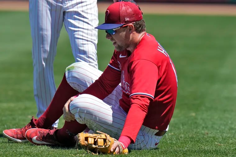 Rhys Hoskins left Thursday's game with a left knee injury.