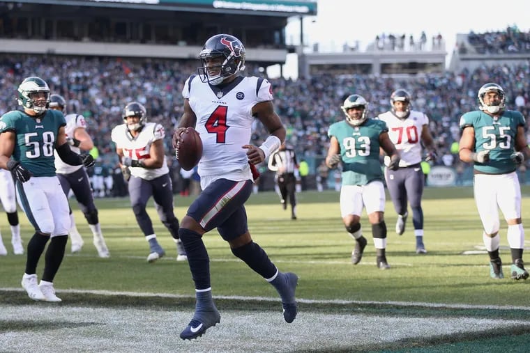 Houston Texans quarterback Deshaun Watson (4) runs for a touchdown in the second quarter of a game against the Eagles at Lincoln Financial Field in South Philadelphia on Sunday, Dec. 23, 2018.