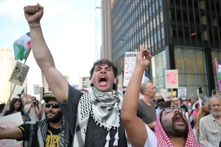 Protesters demonstrate prior to the Democratic National Convention Sunday, Aug. 18, 2024, in Chicago.