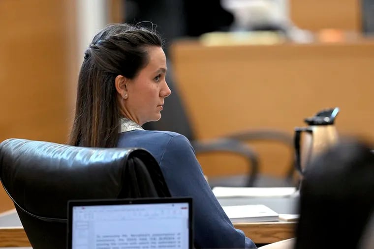Defendant Ashley Benefield glances back after the jury retired to deliberate during her trial at the Manatee County Judicial Center in Bradenton, Fla. Benefield was on trial for the 2020 shooting death of her husband.