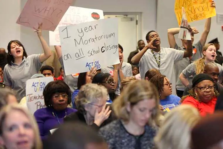 Dozens of protesting parents and students signed up to speak at the SRC about school closings, Thursday, January 17, 2013. (  Steven M. Falk / Staff Photographer )