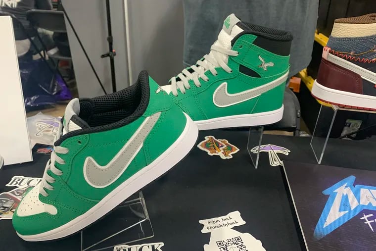 Custom Air Jordan 1s with the Eagles emblem made by Jim Buck of Levittown on display at the Got Sole sneaker convention in Oaks.