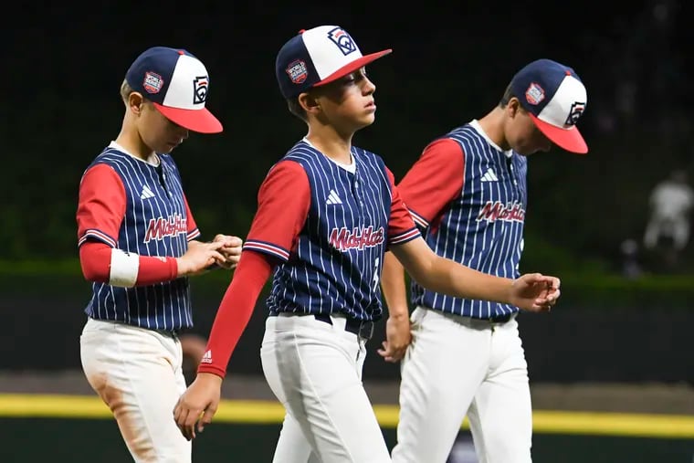 Mid-Atlantic players leave the field at the end of a Little League World Series game against Southwest at Howard J. Lamade Stadium in South Williamsport, Pa. on Thursday, Aug. 15, 2024. Southwest won 9-0.