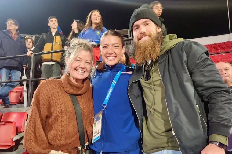 Erin Marsh, center, with her brother Brandon and their mother Sonja at the Pan Am Games in 2023.