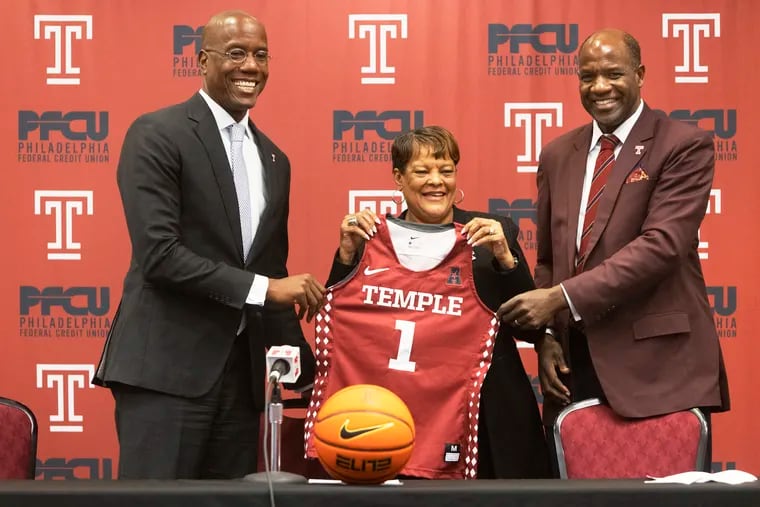 Diane Richardson is introduced at Temple University Liacouras Center as the new women’s basketball coach. Photo taken at Temple University, Wednesday, April 6, 2022. From left are Jason Wingard, Temple President, Diane Richardson, new women’s basketball coach, Arthur Johnson, Vice President and Director of Athletics.