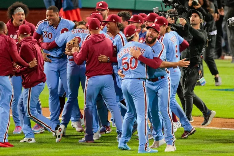 The Phillies celebrate their Game 4 win of the National League Division Series against the Atlanta Braves on Oct. 12, 2023, at Citizens Bank Park.