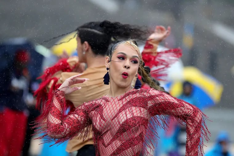 Anadaniela Gerena, of the Palante Dance Company, performs with her group in front of the Philadelphia Museum of Art.