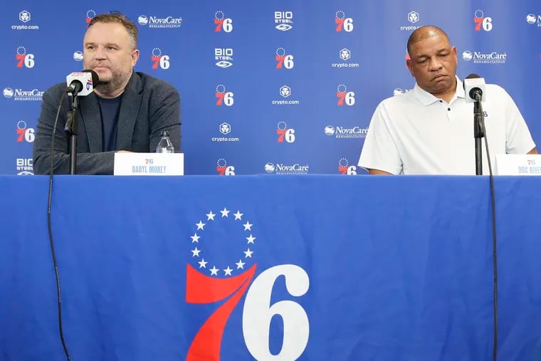 Sixers President Daryl Morey and coach Doc Rivers listen to questions from the media at the Sixers Training Complex  in Camden on Friday.  The Sixers were eliminated from the playoffs after losing to the Miami Heat on Thursday.