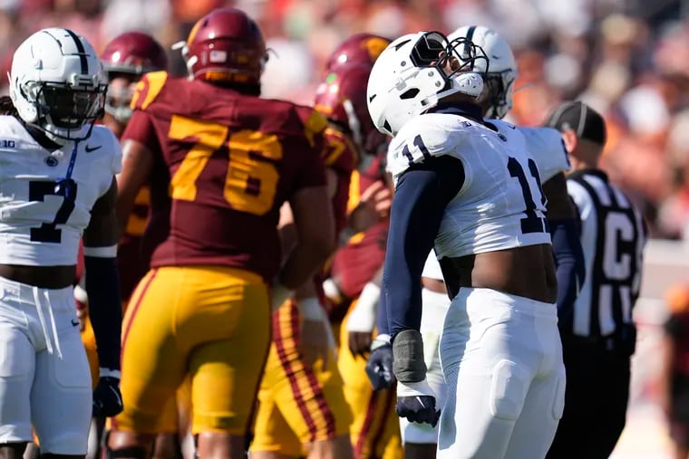 Penn State defensive end Abdul Carter (11) reacts after sacking Southern California quarterback Miller Moss during the second half Saturday in Los Angeles.