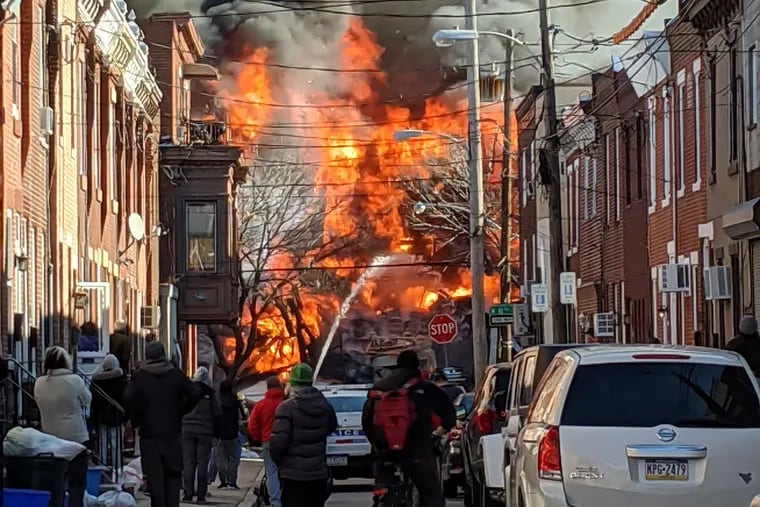 A view of a fire on 8th Street between Dickinson and Reed in Philadelphia on Thursday, Dec. 19, 2019.