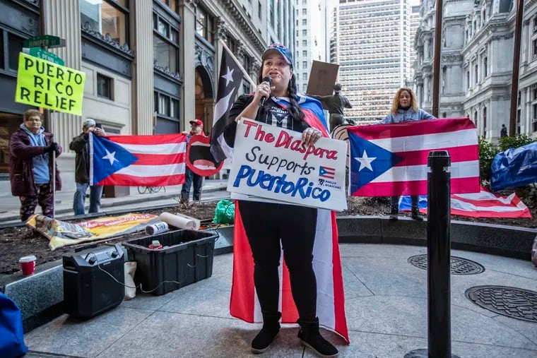 Puerto Ricans protest over unused emergency aid, demand