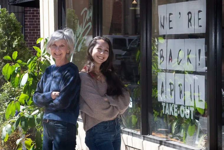 Day by Day owner Robin Barg (left) and her daughter, Molly, outside of the restaurant at 21st and Sansom Streets.